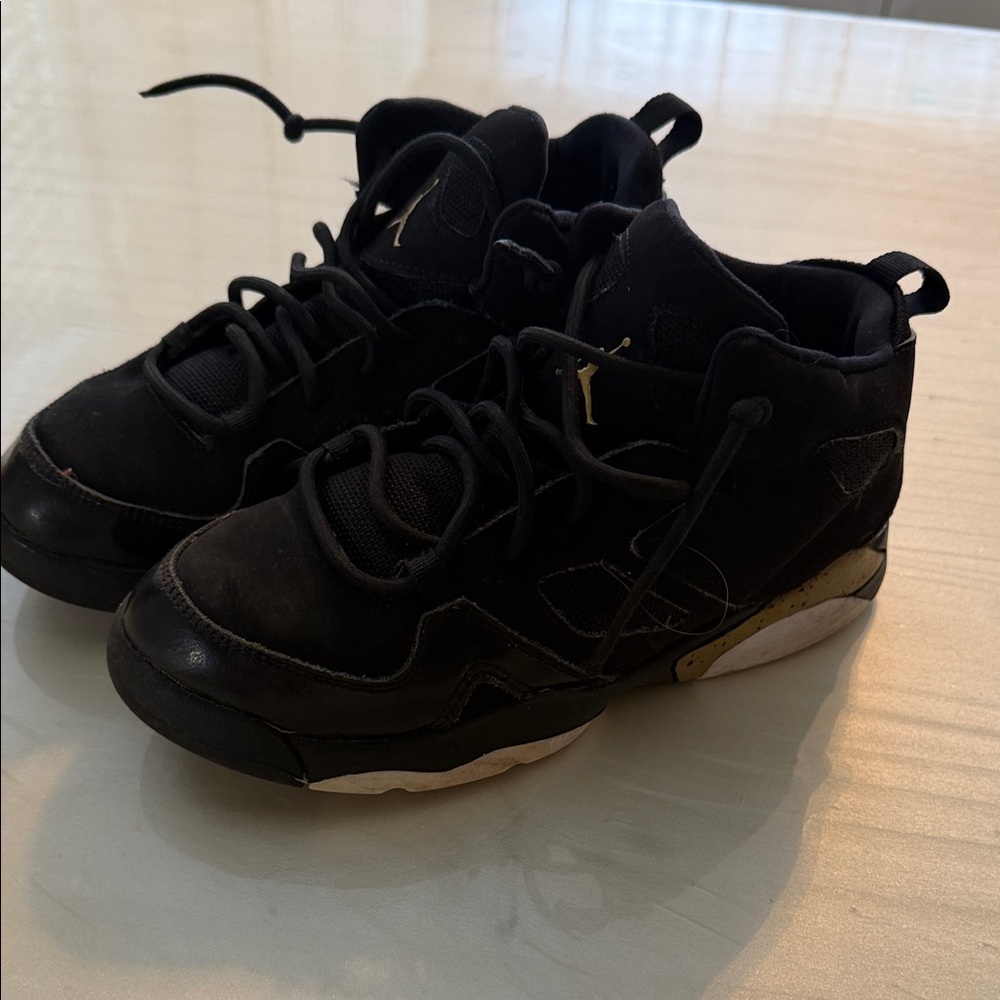 Jordan Kids Black and Gold High-Top Sneakers